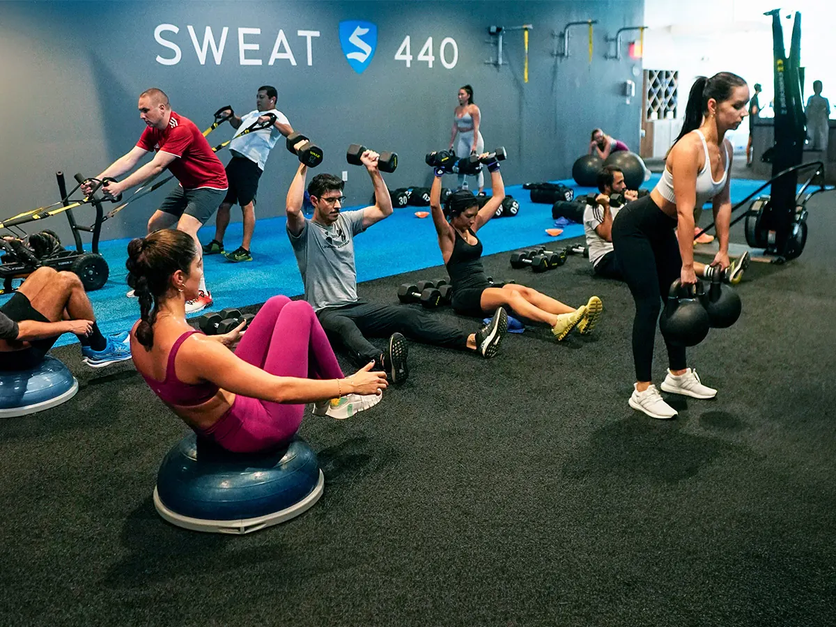 SWEAT440 members in a flex-time group fitness class