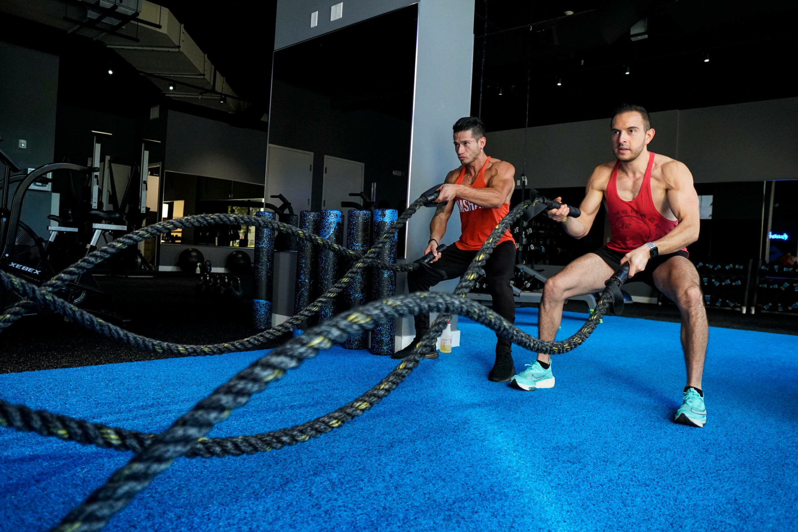 Cross training two men ropes