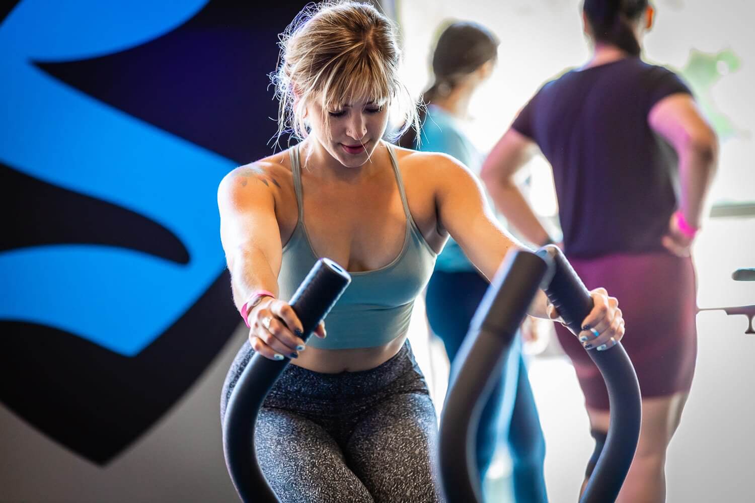 Woman working out at fitness studio