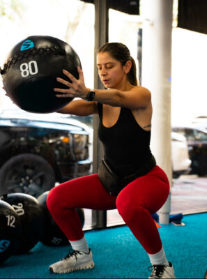 Woman working out at SWEAT440