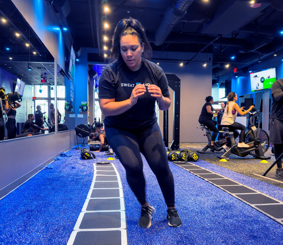 Christina SWEAT440 Woman working out at SWEAT440